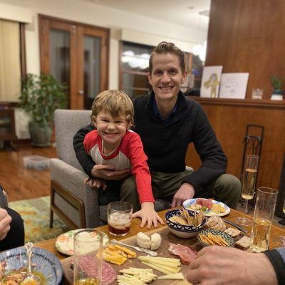 Jason and his son in a comfortable, well insulated living room