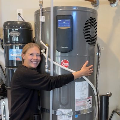 Lauren hugging her heat pump water heater